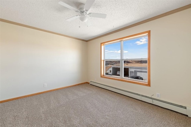 407 S 3rd St Unit 407, Hayden, CO 81639 - spare room featuring baseboard heating, light carpet, crown molding, a textured ceiling, and ceiling fan