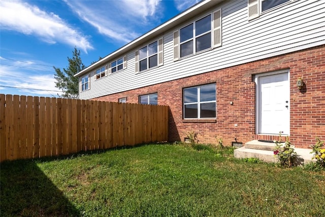 407 S 3rd St Unit 407, Hayden, CO 81639 - rear view of house featuring brick siding