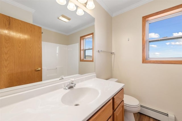 407 S 3rd St Unit 407, Hayden, CO 81639 - full bathroom with a baseboard radiator, vanity, a shower, crown molding, and wood finished floors