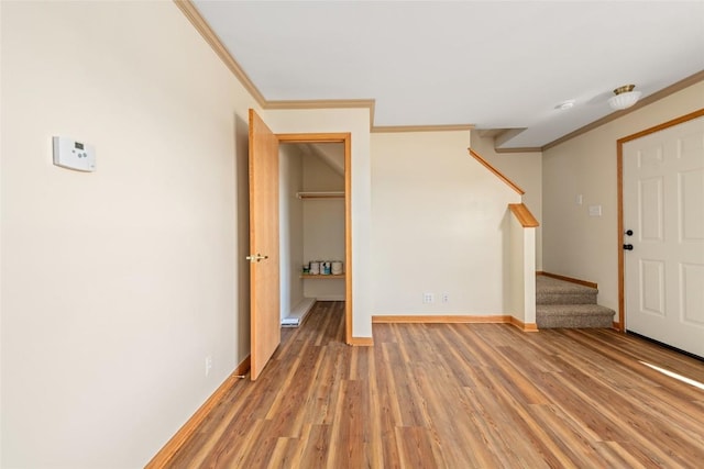407 S 3rd St Unit 407, Hayden, CO 81639 - foyer with crown molding, stairway, and light wood finished floors