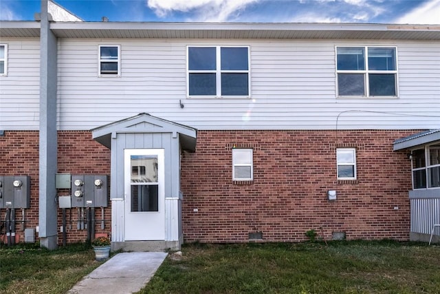 407 S 3rd St Unit 407, Hayden, CO 81639 - view of front facade with brick siding and a front yard