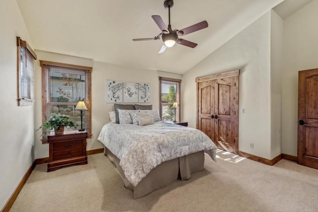 1138 Longview Cir, Steamboat Springs, CO 80487 - bedroom featuring light carpet, lofted ceiling, baseboards, and a ceiling fan