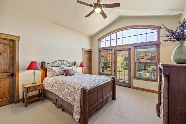 1138 Longview Cir, Steamboat Springs, CO 80487 - bedroom with access to exterior, light colored carpet, baseboards, vaulted ceiling, and ceiling fan