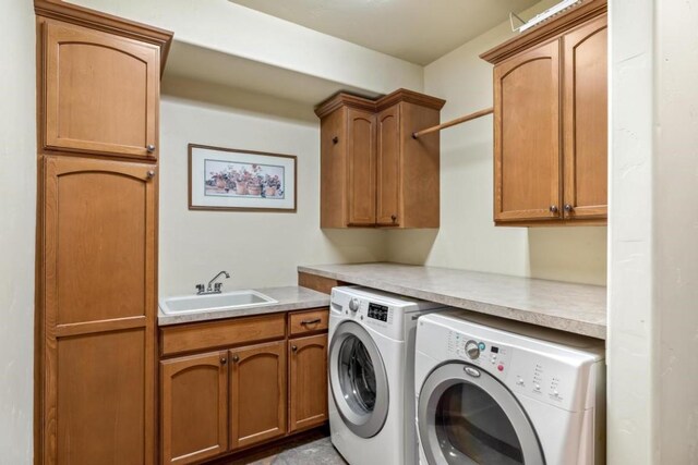 1138 Longview Cir, Steamboat Springs, CO 80487 - laundry area featuring washer and clothes dryer and cabinet space