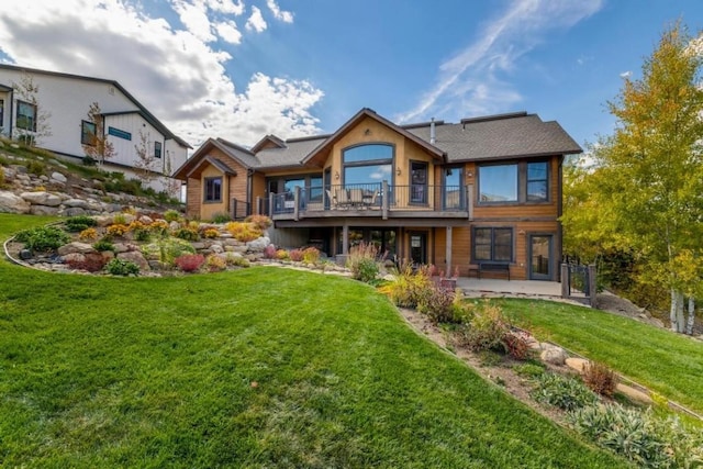 1138 Longview Cir, Steamboat Springs, CO 80487 - rear view of property featuring a yard, a deck, and a patio area