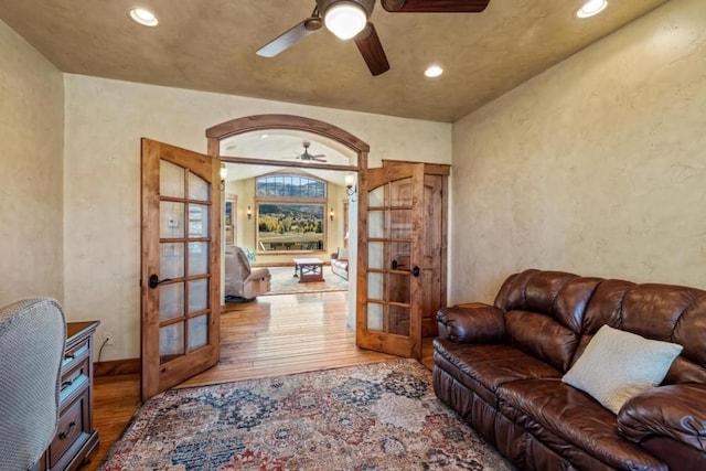 1138 Longview Cir, Steamboat Springs, CO 80487 - office with french doors, wood finished floors, a ceiling fan, recessed lighting, and a textured wall