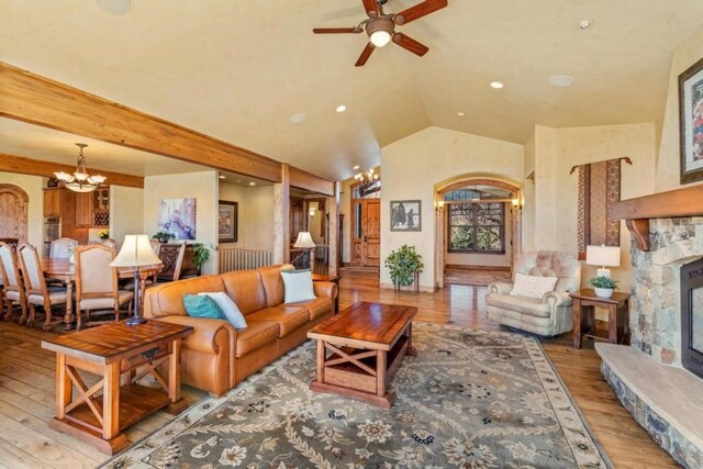 1138 Longview Cir, Steamboat Springs, CO 80487 - living area featuring wood finished floors, a chandelier, a ceiling fan, lofted ceiling, and recessed lighting