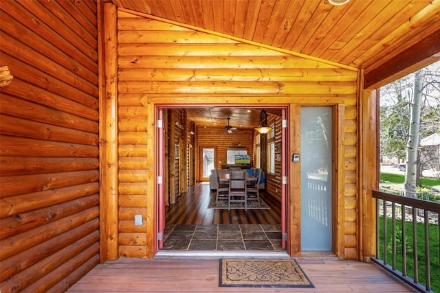 sunroom / solarium with vaulted ceiling