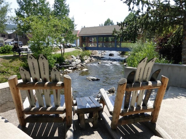 view of community featuring a gazebo and a water view