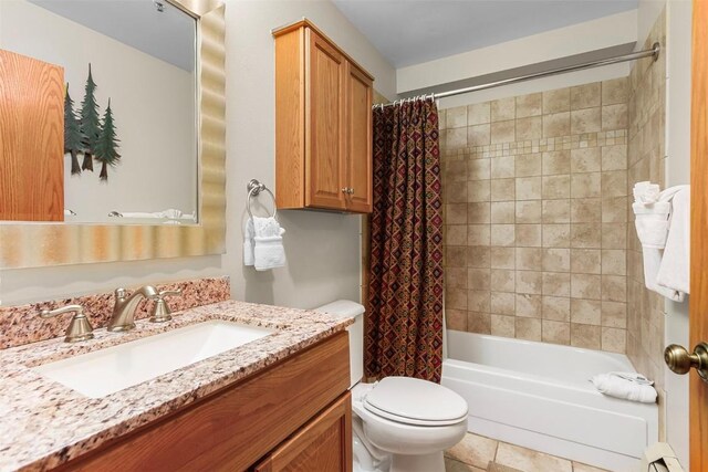 full bathroom with vanity, a baseboard radiator, shower / bathtub combination with curtain, tile patterned flooring, and toilet