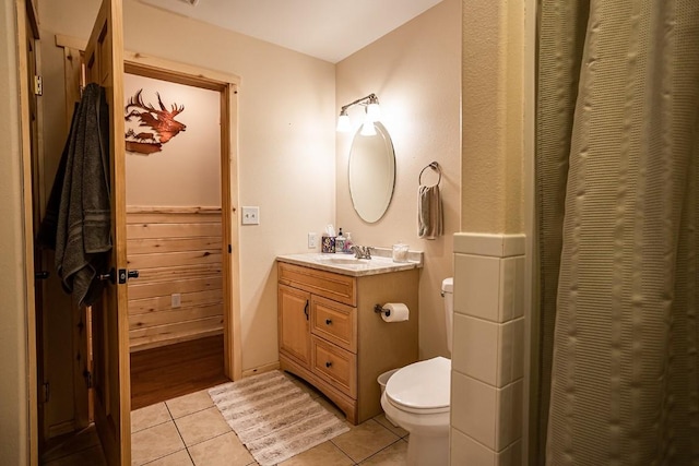 420 County Road 64, Craig, CO 81625 - bathroom featuring vanity, toilet, a closet, and tile patterned floors