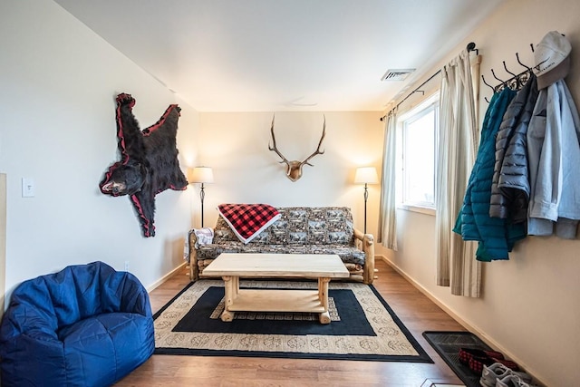 420 County Road 64, Craig, CO 81625 - living area with visible vents, wood finished floors, and baseboards