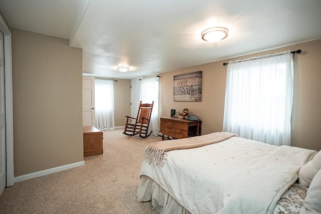 420 County Road 64, Craig, CO 81625 - bedroom with baseboards and light carpet