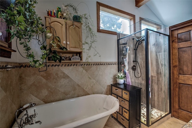 14 Rock Springs Rd, Breckenridge, CO 80424 - full bathroom featuring tile walls, a freestanding bath, a shower stall, and tile patterned floors