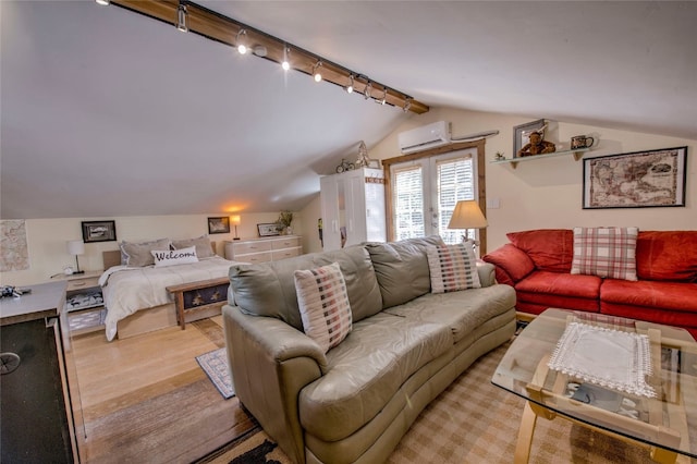 14 Rock Springs Rd, Breckenridge, CO 80424 - living area featuring a wall mounted AC, lofted ceiling, track lighting, and light wood finished floors