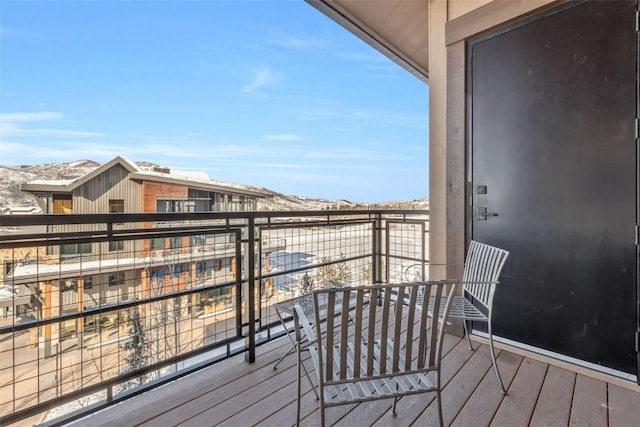 balcony featuring a mountain view