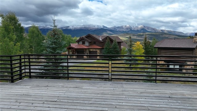 wooden terrace with a mountain view