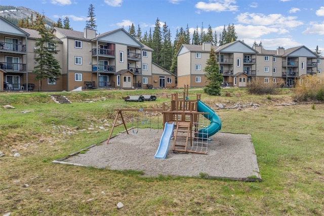 67 Peaks View Ct Unit 232, Blue River, CO 80424 - communal playground with a lawn and a residential view