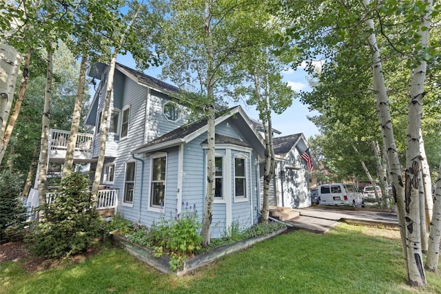 211 S High St, Breckenridge, CO 80424 - view of home's exterior with a yard