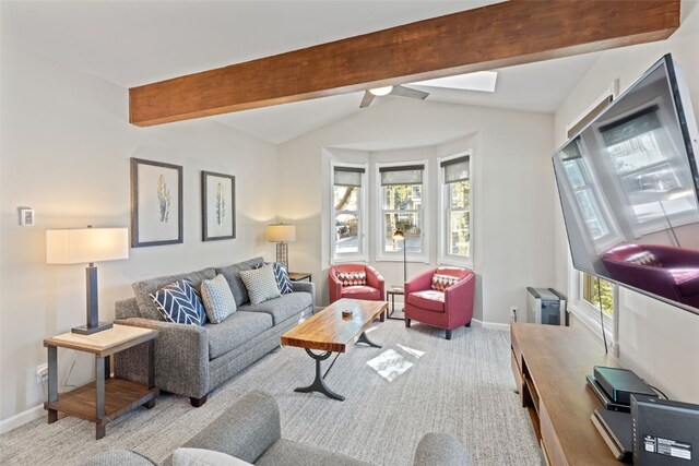 211 S High St, Breckenridge, CO 80424 - living area featuring vaulted ceiling with beams, baseboards, carpet floors, and a ceiling fan