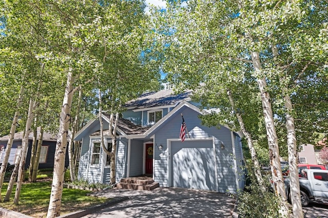 211 S High St, Breckenridge, CO 80424 - chalet / cabin featuring a garage and driveway
