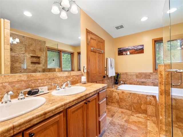 50 Sunset Dr, Breckenridge, CO 80424 - full bathroom with a stall shower, plenty of natural light, a bath, double vanity, and recessed lighting