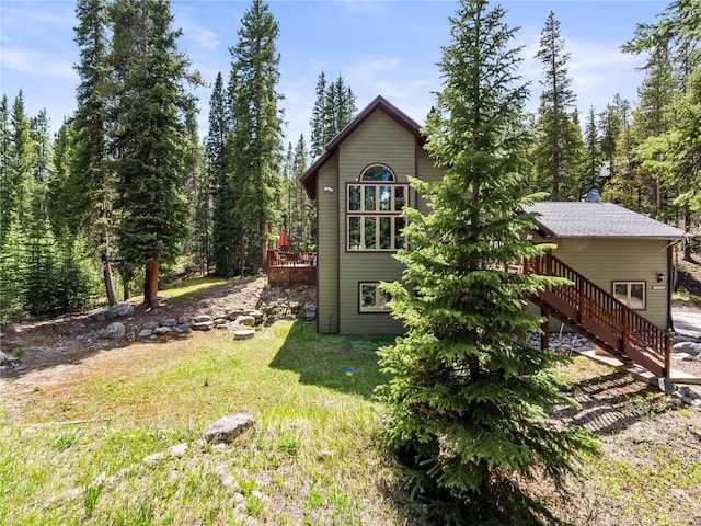 50 Sunset Dr, Breckenridge, CO 80424 - view of side of property featuring a wooden deck, stairs, and a yard