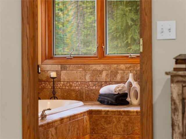 50 Sunset Dr, Breckenridge, CO 80424 - bathroom featuring a garden tub and plenty of natural light