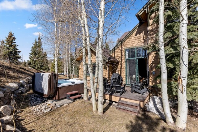 73 Chestnut Ln Unit 73, Breckenridge, CO 80424 - view of yard featuring a hot tub and a deck