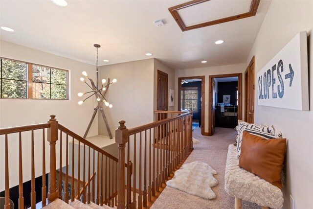 73 Chestnut Ln Unit 73, Breckenridge, CO 80424 - staircase featuring an inviting chandelier, carpet, and recessed lighting