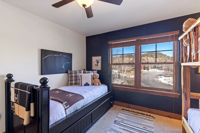73 Chestnut Ln Unit 73, Breckenridge, CO 80424 - bedroom with a ceiling fan, baseboards, and carpet floors