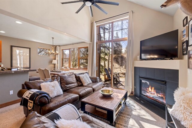 73 Chestnut Ln Unit 73, Breckenridge, CO 80424 - living area with a fireplace, a wealth of natural light, recessed lighting, and ceiling fan with notable chandelier
