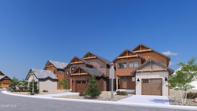 371 Buckhorn Cir, Granby, CO 80446 - view of front of home with a garage, driveway, and board and batten siding