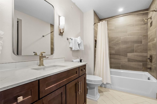 bathroom featuring tile patterned floors, toilet, vanity, and shower / bathtub combination with curtain