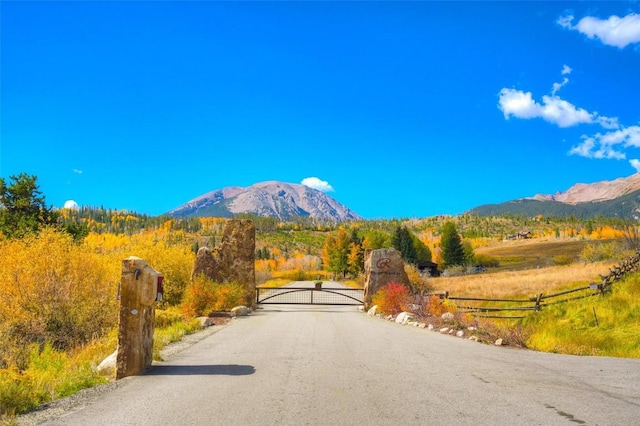 348 Jade Rd, Silverthorne, CO 80498 - view of street featuring a mountain view and a gate