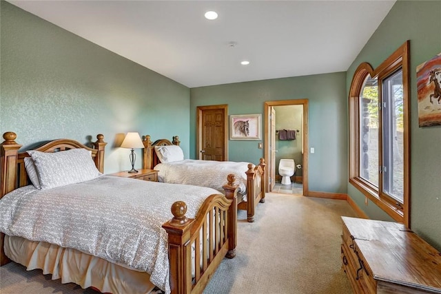 348 Jade Rd, Silverthorne, CO 80498 - carpeted bedroom with baseboards, ensuite bath, and recessed lighting
