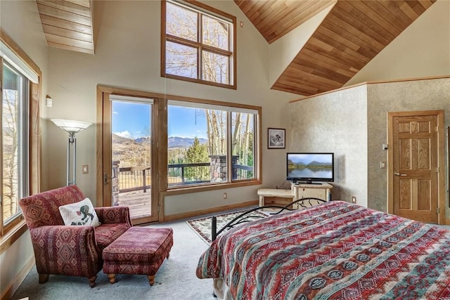 348 Jade Rd, Silverthorne, CO 80498 - carpeted bedroom featuring access to exterior, multiple windows, high vaulted ceiling, wood ceiling, and baseboards