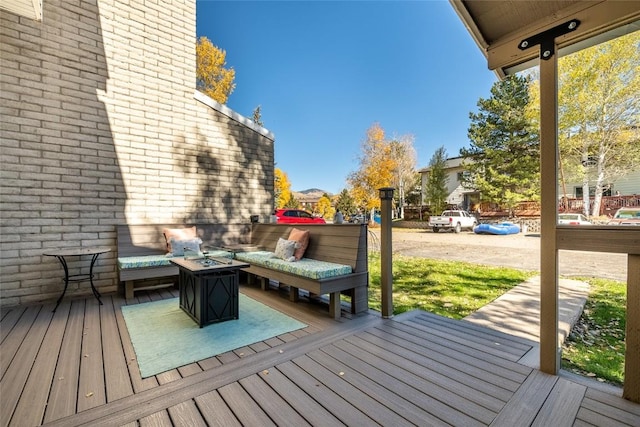 26 Cypress Ct Unit 26, Steamboat Springs, CO 80487 - wooden terrace with an outdoor living space