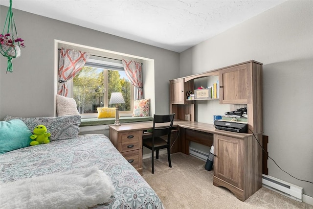 26 Cypress Ct Unit 26, Steamboat Springs, CO 80487 - bedroom featuring light colored carpet and baseboard heating