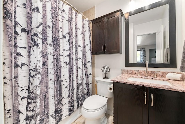26 Cypress Ct Unit 26, Steamboat Springs, CO 80487 - full bathroom featuring a shower with curtain, vanity, and toilet