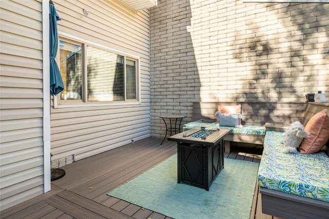 26 Cypress Ct Unit 26, Steamboat Springs, CO 80487 - wooden deck with a fire pit