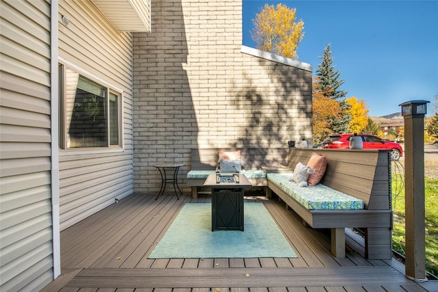 26 Cypress Ct Unit 26, Steamboat Springs, CO 80487 - wooden deck with a fire pit