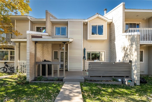 26 Cypress Ct Unit 26, Steamboat Springs, CO 80487 - back of property featuring a yard