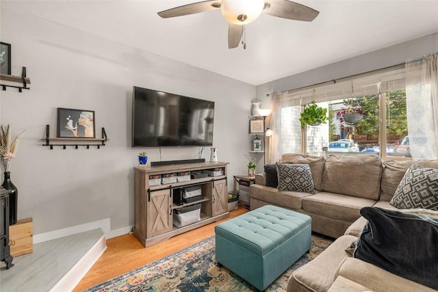 26 Cypress Ct Unit 26, Steamboat Springs, CO 80487 - living room featuring light wood-style floors, a ceiling fan, and baseboards