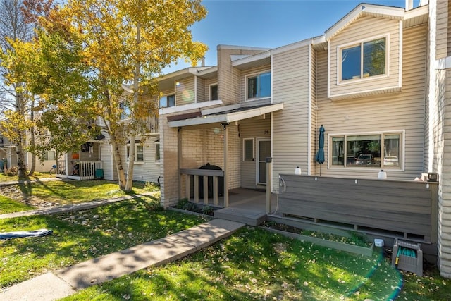26 Cypress Ct Unit 26, Steamboat Springs, CO 80487 - view of front of house with a front lawn