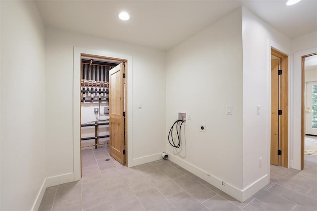 476 County Road 674, Breckenridge, CO 80424 - laundry area featuring electric dryer hookup, washer hookup, recessed lighting, and light tile patterned floors