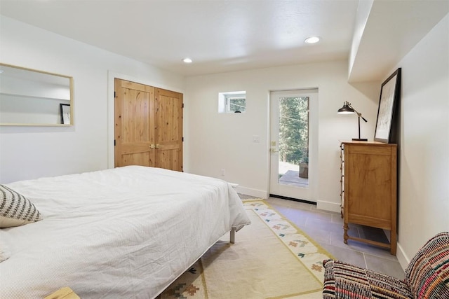 476 County Road 674, Breckenridge, CO 80424 - bedroom with access to exterior, recessed lighting, and light tile patterned floors