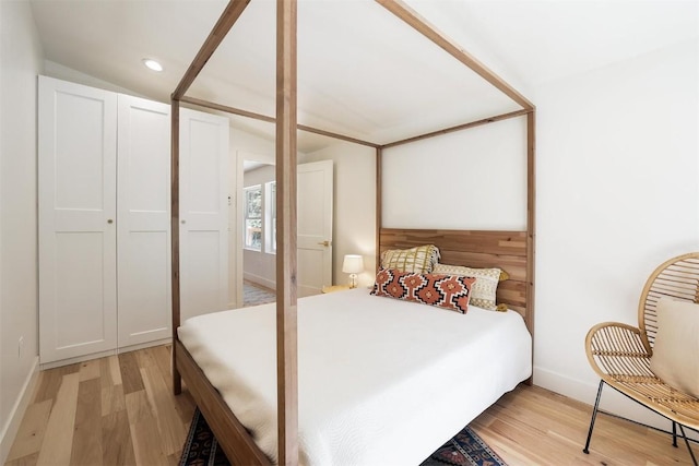 476 County Road 674, Breckenridge, CO 80424 - bedroom featuring light wood-type flooring, recessed lighting, and lofted ceiling