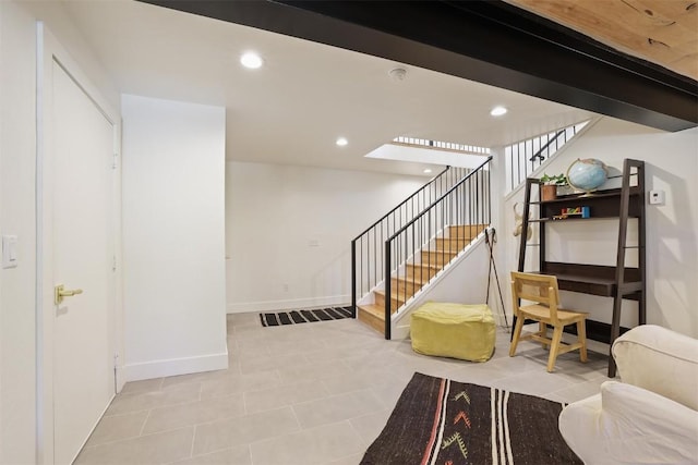 476 County Road 674, Breckenridge, CO 80424 - below grade area with stairway, recessed lighting, and tile patterned floors