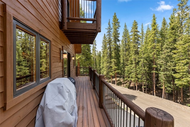 wooden deck featuring grilling area